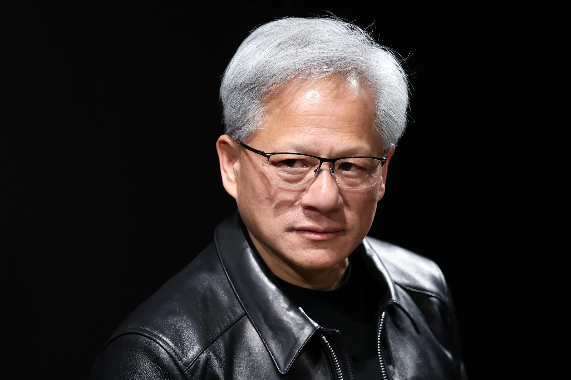 Jensen Huang Says AI May Need Fossil Fuels First as Article Questions Climate Costs