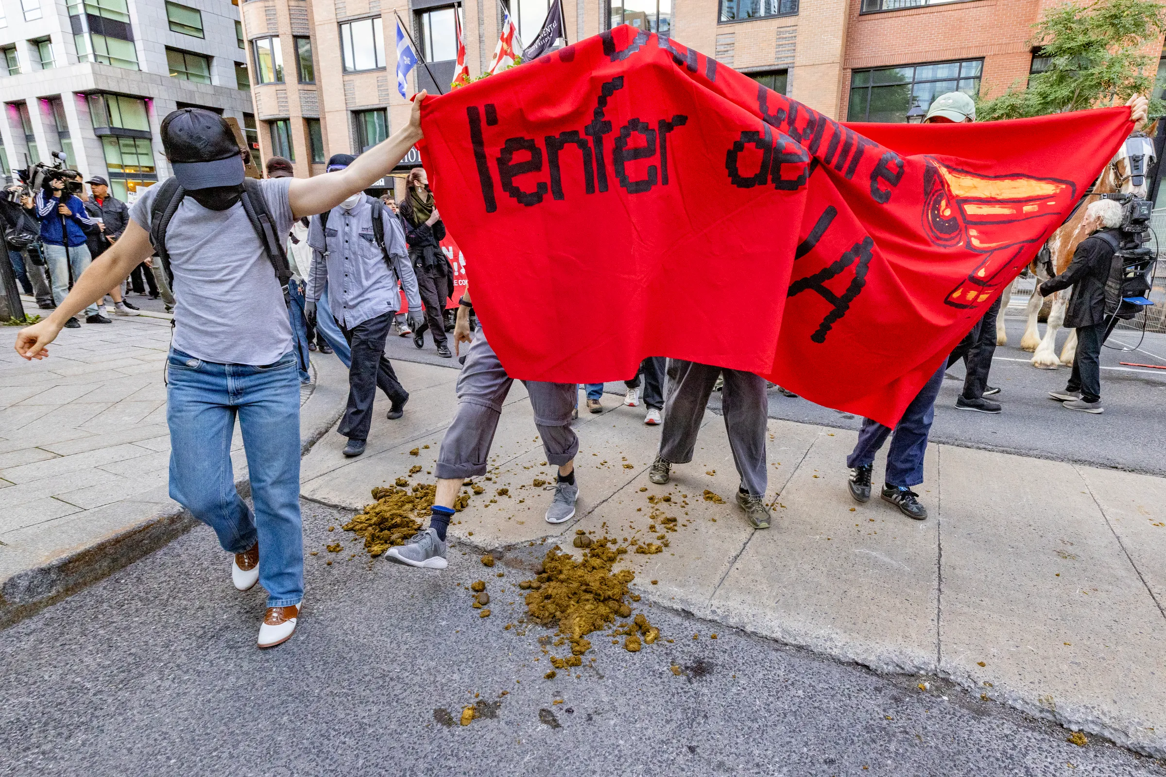 Photos: Anti-AI Protesters March During Montreal Industry Event